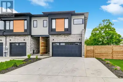 Stunning MODERN FREEHOLD END UNIT Townhome with a spacious DOUBLE CAR GARAGE, loaded with high-end f...