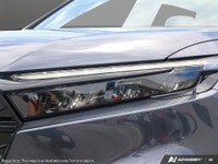 The 2026 Honda CR-V Hybrid EX-L AWD in a striking Blue finish offers both power and precision with i... (image 9)