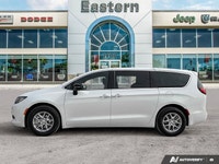 This Chrysler Grand Caravan has a trusty Regular Unleaded V-6 3.6 L/220 engine powering this Automat... (image 1)