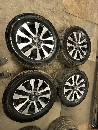 Full set of Tires and Rims off a 2011 Toyota Sequoia. Winter tires are currently sitting @ 6/32nds a...