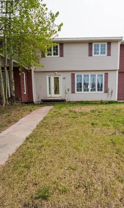 This 3-bedroom row house on the waterside of Tamarack offers a lovely view overlooking the water—gre...