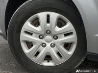 Ready for the road ahead, this 2017 Dodge Grand Caravan Canada Value Package, presented in a sleek B... (image 5)