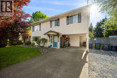 Wonderful family home on a large .222 acre lot with a one bedroom in-law suite on a lovely and peace...