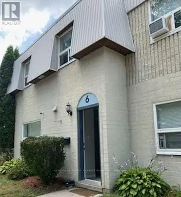 Beautiful 3 bedroom, 2 bath townhome featuring an open concept main floor with 2 large front and rea...