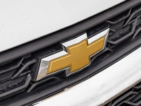 This Chevrolet is a compact and efficient car that is perfect for city driving, commuting, and anyon... (image 9)