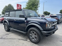 Imagine endless possibilities and the thrill of adventure in this striking 2021 Ford Bronco. Dressed... (image 2)