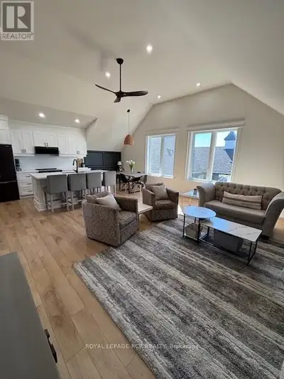 Welcome to this new 1105 sq ft loft above an extra large double car garage in an exclusive enclave o...