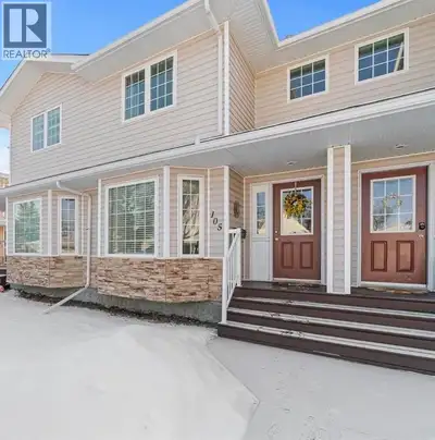 Enjoy the perfect blend of comfort and convenience in this well-maintained townhouse condo, ideally...