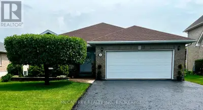 Welcome to this beautiful all-brick bungalow, where timeless curb appeal meets modern comfort and fu...