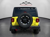 THIS VERY RARE VELOCITY YELLOW WRANGLER RUBICON WITH PLENTY OF OPTIONS INCLUDING 3.6L V6 PENTASTAR E... (image 3)
