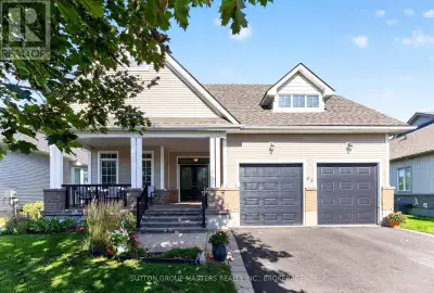 Welcome to 43 Country Club Drive. Gorgeous natural light and golf course views set the stage for thi...