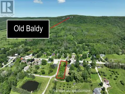 Welcome to this scenic large buildable lot (potential for a multi unit build) in the charming villag...