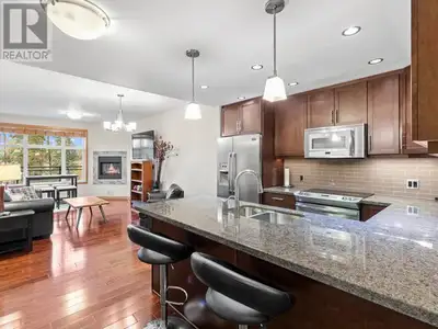 RIVER and GREEN SPACE VIEWS! Take a TOUR now and CLICK the VIDEO! Let me introduce you to this furni...