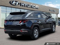 The 2022 Hyundai Tucson in Deep Sea Blue isn't just a vehicle; it's a statement of style and practic... (image 4)