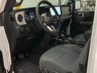 Experience the rugged charm of the new 2026 Jeep Wrangler Sahara 4 Door 4x4 in a striking white fini... (image 9)