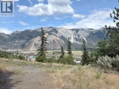 Build Your Dream Home in Beautiful Lillooet, BC! Welcome to 825 Columbia Street – a rare flat vacant...