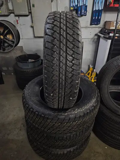 Very nice set of Bridgestone Dueler A/T all terrain tires. 255/70/18 13/32nd tread remaining #3947