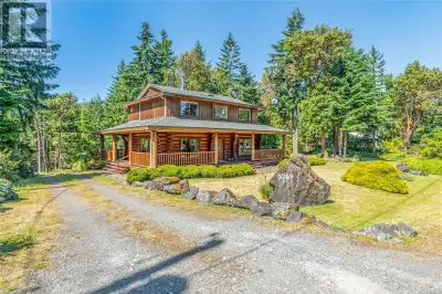 Welcome to Panorama Ridge in Chemainus! This custom log home sits on 2.02 wooded acres and features...
