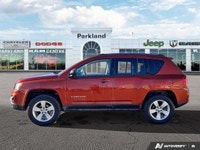 Adventure meets everyday comfort in this *2012 Jeep Compass Sport*, finished in eye-catching *Copper... (image 1)