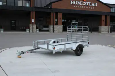 SPECIFICATIONS G.V.W.: 1,980 lbs. Payload: 1,600 lbs. Interior Width: 5' Interior Length: 7' 5" exte...