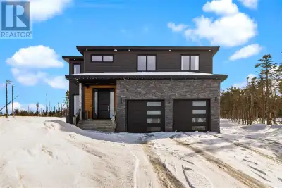 Welcome to your dream home nestled in the breathtaking surroundings of Outer Cove. Situated on a met...