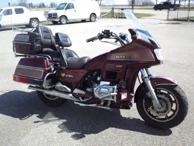 sonic cycle has a 1987 honda gl -1200 aspencade goldwing parts bike was on the road 2 years ago runs...