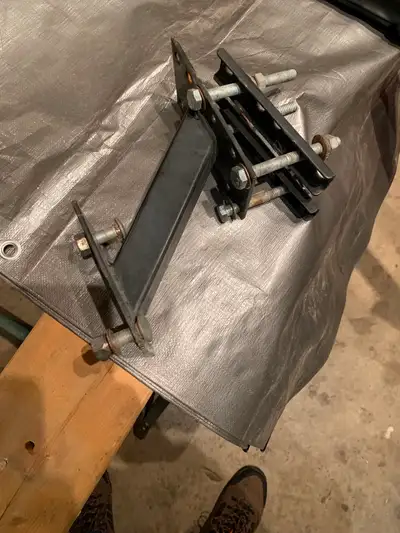 Spare tire rack for a utility trailer $15.00 and a truck bed rack (adjustable width) $50.00 .519 465...