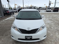 This 2014 Toyota Sienna LE in classic white is a proven, family-friendly minivan known for outstandi... (image 8)