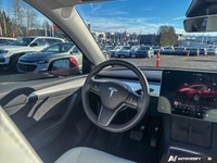 This Tesla Model Y boasts a Electric engine powering this Automatic transmission. Wireless Phone Con... (image 8)