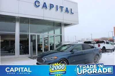 Capital Ford Lincoln Winnipeg Ltd (MB's #1 Rated Ford Store) This 2019 Blue Ford Fusion is a stunner...