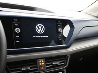 The Taos comes with a 158-hp turbocharged 1.5-liter four-cylinder, its road manners are refined, and... (image 6)