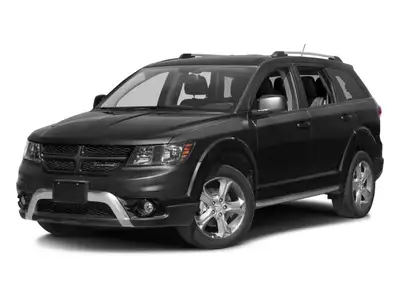 The 2017 Dodge Journey Crossroad, presented in a striking black finish, is equipped with an agile al...