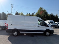 Ready for work. This mid roof transit has power options, divider, bluetooth, a/c, back up camera and... (image 6)