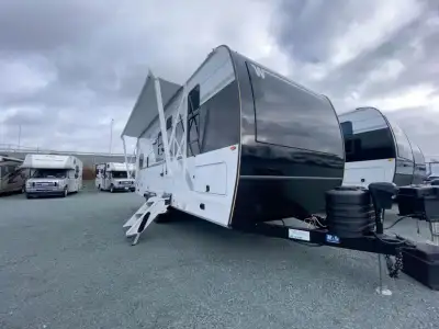 Winnebago Thrive travel trailer 22MBH highlights: Olympic Queen Murphy Bed U-Shaped Dinette Slide Re...