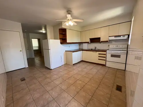 Bright and spacious main-floor unit in a well-maintained triplex located in the highly desirable Col...