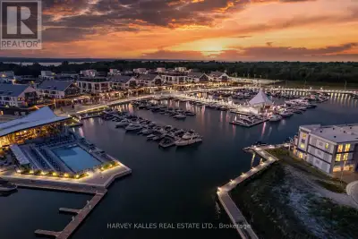 STUNNING MARINA VIEWS! Luxury waterfront townhome in the exclusive marina community of Friday Harbou...
