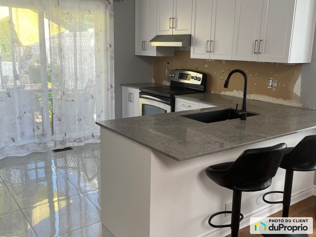 $679,000 - Split Level for sale in Repentigny (Repentigny) — photo 1