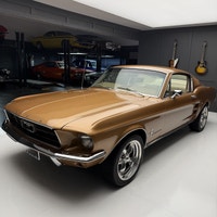 Check out this 1967 Ford Mustang Fastback. This is a gorgeous car. The gold paint is incredible and... (image 1)