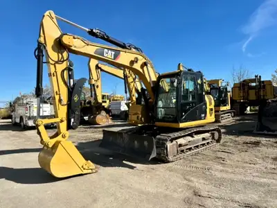 Here is an extremely nice Cat 311F. Blade, hydraulic thumb. Only 2500 hours. BUY, RENT, LEASE, RENT...