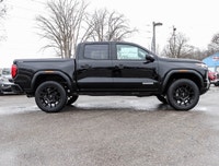 Meet the 2026 GMC Canyon Elevation Crew Cab Short Box 4-Wheel Drive Elevation, a black powerhouse re... (image 2)