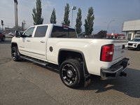 Get ready to experience top-tier power and luxury with this 2015 GMC Sierra 3500HD Denali, a diesel-... (image 2)