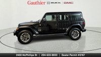 The 2022 Jeep Wrangler Unlimited Sahara is a versatile 4-door SUV that blends classic Jeep off-road... (image 4)