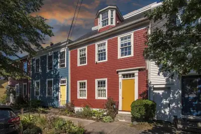 This elegant, three-story, 2-century old home will take your breath away! Situated mere steps from C...
