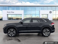 Command the road in this stunning 2023 Volkswagen Atlas Cross Sport Execline, resplendent in Deep Bl... (image 1)