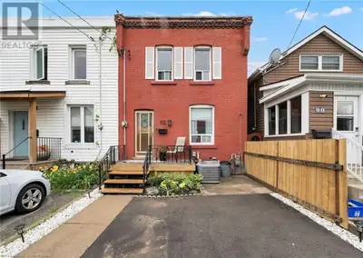 GRACIOUS CHARACTER HOME. Beautifully updated 3 Bedroom freehold end unit townhome. 2 1/2 baths and f...