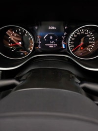 Step into the commanding presence of the 2018 Jeep Compass Altitude 4x4, cloaked in a stunning black... (image 7)