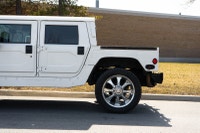 2000 AM General H1 HMC4 finished in a rugged military-inspired design is the ultimate expression of... (image 7)
