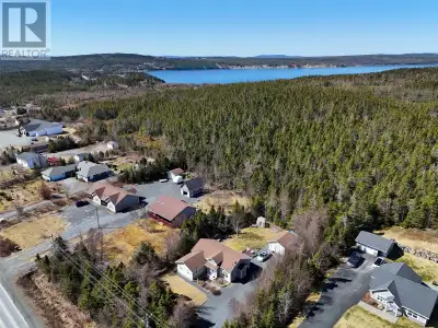 Just 12 years young, wheelchair accessible and tucked away with tons of privacy! This home has the c...