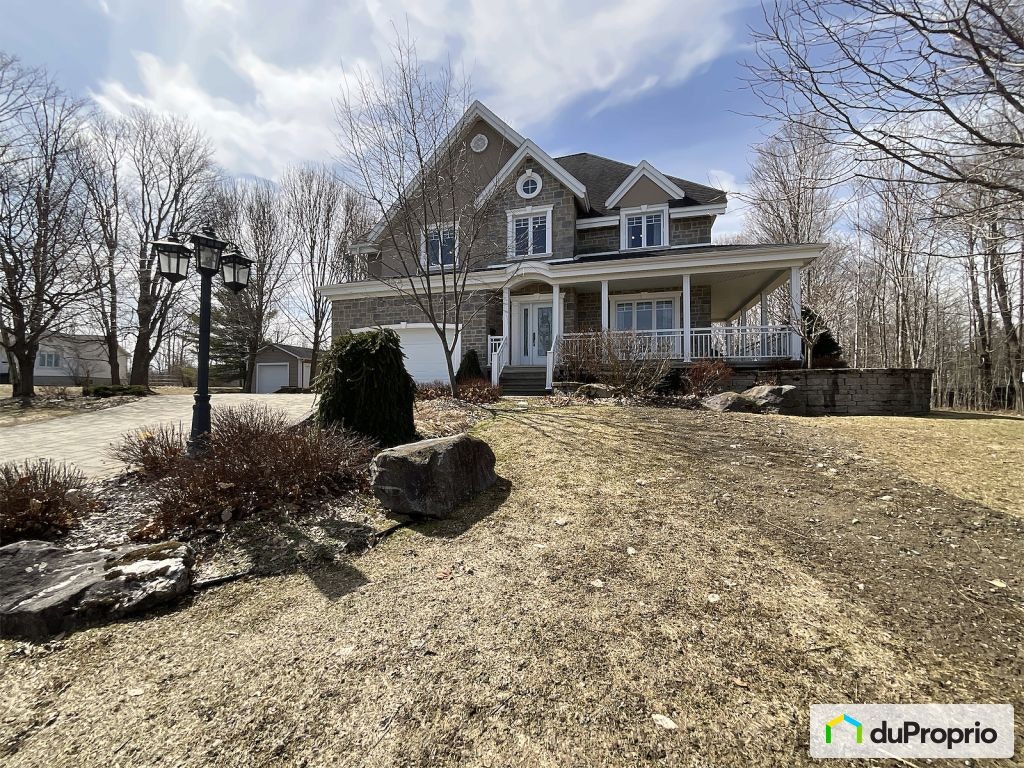 $595,000 - 2 Storey for sale in Val-des-Sources — photo 1