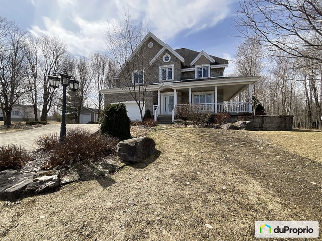 $595,000 - 2 Storey for sale in Val-des-Sources — photo 1